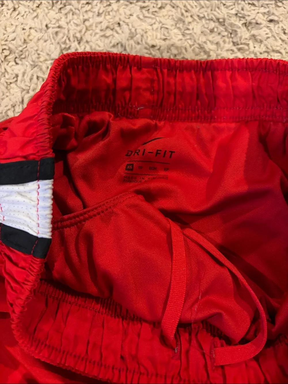 Nike Red Running Shorts with White Side Panels and Black Trim